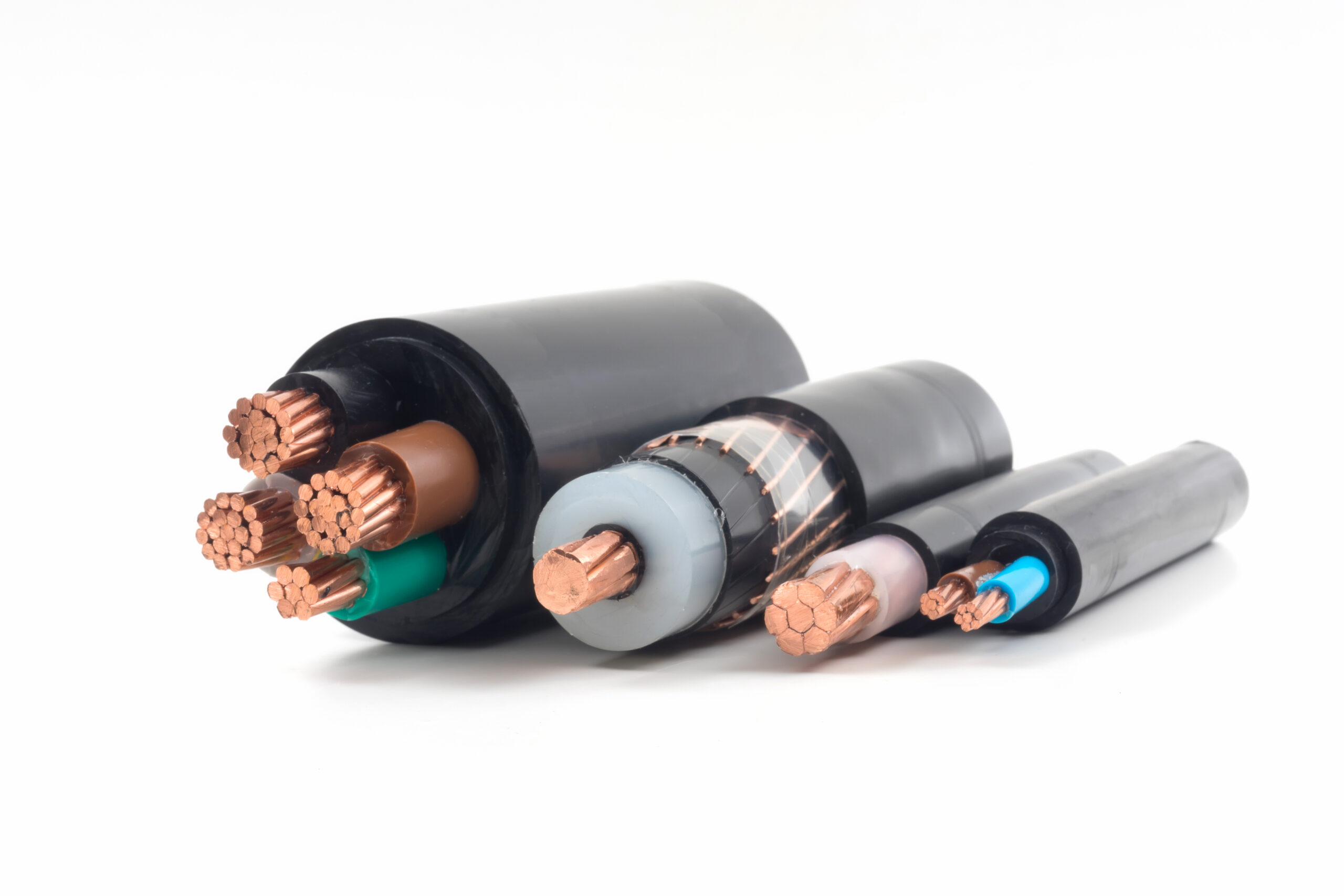 Coiled bundle of colorful electrical wires with a green connector visible on the left.