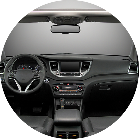 Vector 6-car | Reedy Chemical Foam Front interior of a modern car, showing the steering wheel, dashboard, and center console.